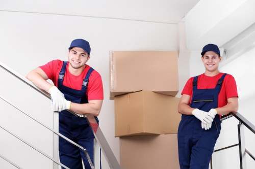 Removal van and moving team preparing a Westminster home move