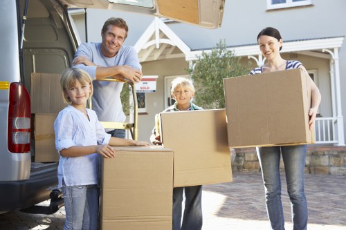 Local Westminster removals team handling fragile items during a house move