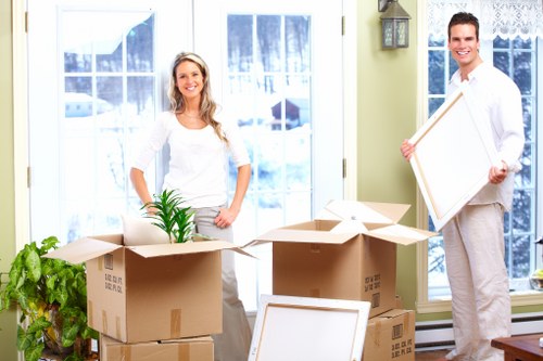 Careful loading of boxes and furniture into a removal van for a Westminster move